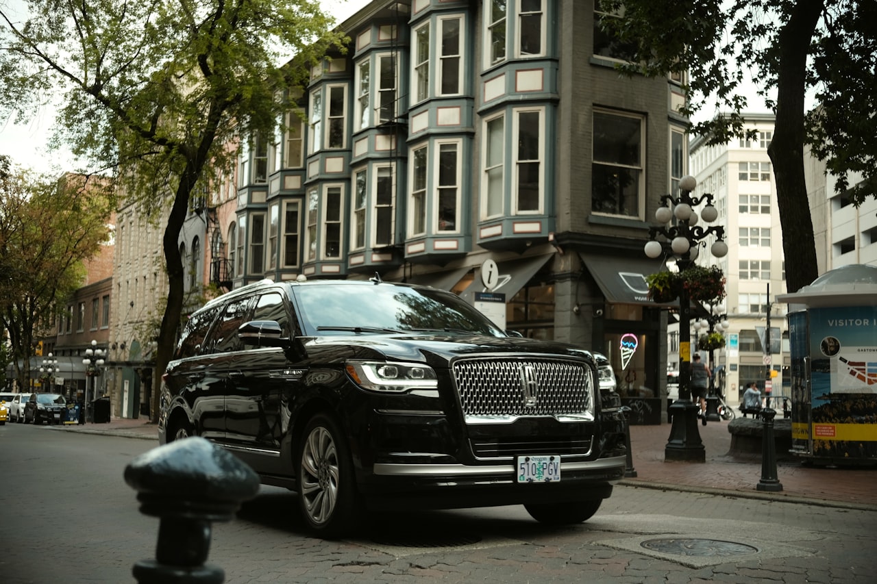 Black Lincoln luxury SUV in the city